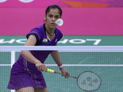 Saina Nehwal plays against Switzerland`s Sabrina Jaquet, unseen, at a women`s singles badminton match of the 2012 Summer Olympics in London.