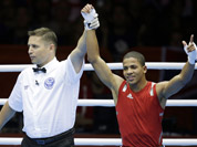 Puerto Rico`s Felix Verdejo Sanchez,  reacts after beating Panama`s Juan Huertes Garcia, during their men`s light 60-kg boxing match at the 2012 Summer Olympics in London.