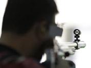 Gagan Narang trains for the 50-meter rifle 3 positions event, at the Royal Artillery Barracks, ahead of the start of the 2012 Summer Olympics in London. 