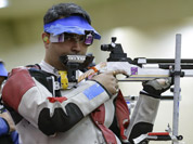 Gagan Narang shoots during qualifiers for the men`s 10-meter air rifle event at the 2012 Summer Olympics in London.