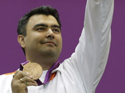 Gagan Narang celebrates winning the bronze medal in the men`s 10-meter air rifle at the 2012 Summer Olympics in London.