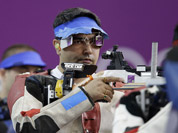 Gagan Narang shoots during the men`s 10-meter air rifle final at the 2012 Summer Olympics in London. Gagan placed third to win the bronze medal.