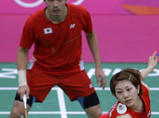 Japan`s Reiko Shiota, right, and Shintaro Ikeda, play against Canada`s Toby NG and Grace Gao, unseen, at a mixed doubles badminton match of the 2012 Summer Olympics.