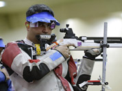 Gagan Narang shoots during qualifiers for the men`s 10-meter air rifle event at the 2012 Summer Olympics in London.