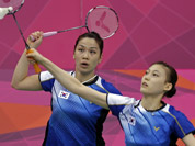 South Korea`s Jung Kyung-eun, left, and Kim Ha-na play against Valeria Sorokina and Nina Vislova, or Russia, during a women`s doubles badminton match at the 2012 Summer Olympics in London. 