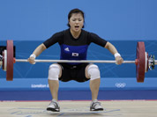 Yang Eun-Hye of South Korea competes during the women`s 58-kg weightlifting competition at the 2012 Summer Olympics, Monday, July 30, 2012, in London.Yang Eun-Hye of South Korea competes during the women`s 58-kg weightlifting competition at the 2012 Summer Olympics in London.