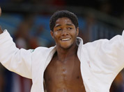 Dex Elmont of Netherlands reacts after defeating Ugo Legrand of France during the men`s 73-kg judo competition at the 2012 Summer Olympics in London. 