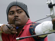 Jayanta Talukdar shoots during an elimination round of the individual archery competition at the 2012 Summer Olympics in London.