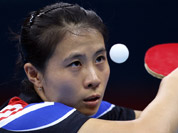 Kim Kyungah of South Korea competes against Tianwei Feng of Singapore during the women`s singles table tennis competition at the 2012 Summer Olympics in London.