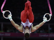 US gymnast Jacob Dalton performs on the rings during the Artistic Gymnastic men`s team final at the 2012 Summer Olympics.