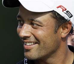 Atwal makes cut, Tiger and Mickelson miss out