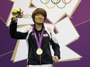 South Korea`s Kim Jangmi reacts after firing her final shots and realizing she has won gold in the women`s 25-meter pistol event, at the 2012 Summer Olympics.