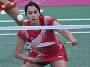 India`s Ashwini Ponappa, left, and Jwala Gutta, play against Singapore`s Sari Shinta Mulia and Yao Lei, unseen, at a women`s doubles badminton match of the 2012 Summer Olympics in London.