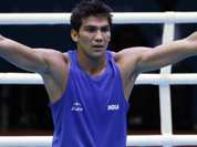 India`s Kumar Manoj reacts after defeating Turkmenistan`s Serdar Hudayberdiyev in a light welter 64-kg boxing match at the 2012 Summer Olympics in London.