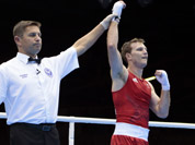 Australia`s Jeffrey Horn, right, reacts after defeating Zambia`s Gilbert Choombe in a men`s light welter 64-kg boxing match at the 2012 Summer Olympics in London.