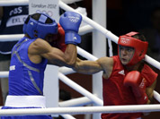 Sweden`s Anthony Yigit, right, fights Puerto Rico`s Francisco Vargas Ramirez during a light welterweight 64-kg preliminary boxing match at the 2012 Summer Olympics in London.