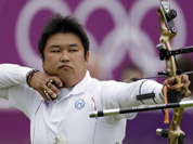 South Korea`s Oh Jin-hyek shoots during an elimination round of the individual archery competition at the 2012 Summer Olympics in London.