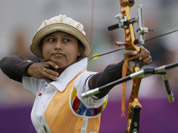 Indonesia`s Ika Yuliana Rochmawati shoots during an elimination round of the individual archery competition at the 2012 Summer Olympics in London.