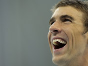 United States` Michael Phelps reacts after receiving his gold medal for the men`s 4x200-meter freestyle relay swimming final at the Aquatics Centre in the Olympic Park during the 2012 Summer Olympics in London.