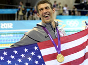 From left, United States` Michael Phelps, Conor Dwyer, Ricky Berens and Ryan Lochte pose with their gold medals for the men`s 4x200-meter freestyle relay swimming final at the Aquatics Centre in the Olympic Park during the 2012 Summer Olympics in London.