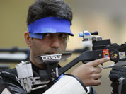 ndia`s Abhinav Bindra shoots during qualifiers for the men`s 10-meter air rifle event at the 2012 Summer Olympics, Monday, July 30, 2012, in London.
