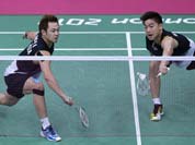 Malaysia`s Koo Kien Keat, left, and Tan Boon Heong, play against Thailand`s Maneepong Jongjit and Bodin Isara, unseen, at a men`s doubles badminton quarterfinal match of the 2012 Summer Olympics.