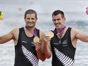 New Zealand`s Joseph Sullivan, right, and Nathan Cohen celebrate after winning the gold medal for the men`s rowing double sculls in Eton Dorney, near Windsor, England, at the 2012 Summer Olympics.