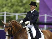 Hiroshi Hoketsu from Japan rides Whisper in the equestrian dressage competition, at the 2012 Summer Olympics.