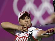 Russia`s Ksenia Perova shoots during the individual archery competition at the 2012 Summer Olympics.