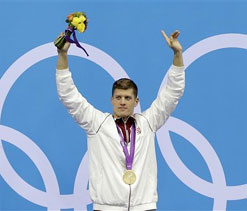 Gyurta wins 200m breaststroke gold, sets world record 