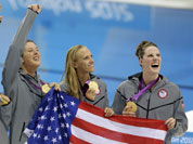 From right, United States` Missy Franklin, United States` Dana Vollmer, United States` Allison Schmitt and United States` Shannon Vreeland pose with their gold medals for the women`s 4x200-meter freestyle relay swimming final at the Aquatics Centre in the Olympic Park during the 2012 Summer Olympics