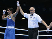 Vijender, left, reacts after defeating the United States` Terrell Gausha in a men`s middle weight 75-kg boxing match at the 2012 Summer Olympics.