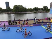 Triathletes compete in the triathlon at the 2012 Summer Olympics.