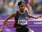 Sudha Singh jumps during a heat of the women`s 3000-meter steeplechase during the athletics in the Olympic Stadium at the 2012 Summer Olympics.