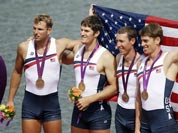 US rowers, from right, Scott Gault, Charles Cole, Henrik Rummel and Glenn Ochal celebrate after winning the bronze medal for the men`s rowing four in Eton Dorney, near Windsor, at the 2012 Summer Olympics.