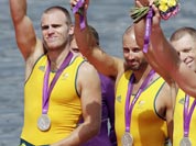 Australia`s from right, Joshua Dunkley-Smith, Drew Ginn, James Chapman and William Lockwood celebrate after winning the silver medal for the men`s rowing four in Eton Dorney, near Windsor, at the 2012 Summer Olympics.