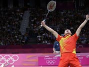 China`s Fu Haifeng, left, and Cai Yun celebrate after beating Koo Kien Keat and Tan Boon Heong, of Malaysia, in a men`s doubles badminton semifinal match at the 2012 Summer Olympics.