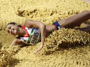 Britain`s Jessica Ennis lands a jump during the long jump heptathlon during the athletics in the Olympic Stadium at the 2012 Summer Olympics.