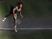 Serena Williams of the United States serves to Victoria Azarenka of Belarus at the All England Lawn Tennis Club in Wimbledon, London at the 2012 Summer Olympics.
