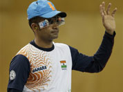India`s Vijay Kumar waves as he is introduced at the start of the men`s 25-meter rapid fire pistol final at the 2012 Summer Olympics, Friday, Aug. 3, 2012, in London. Kumar finished second to win the silver.