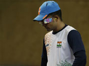 India`s Vijay Kumar prepares to shoot during the men`s 25-meter rapid fire pistol final at the 2012 Summer Olympics, Friday, Aug. 3, 2012, in London. Kumar finished second to win the silver.
