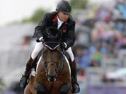 Nick Skelton, of Great Britain, rides Big Star, during the equestrian show jumping competition at the 2012 Summer Olympics.