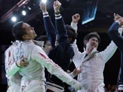 Team Japan celebrate beating Germany to advance to the finals during the men`s foil team fencing competition at the 2012 Summer Olympics.