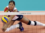 Dominican Republic`s Prisilla Altagracia Rivera Brens (14) makes a dig on a shot by Algeria during a women`s volleyball preliminary match at the 2012 Summer Olympics.