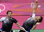 South Korea`s Lee Yong-dae, right, and Chung Jae-sung play against Malaysia`s Koo Kien Keat and Tan Boon Heong in the men`s doubles badminton bronze medal match at the 2012 Summer Olympics.