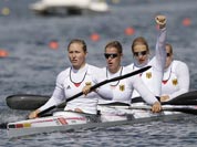 Germany`s, left to right, Carolin Leonhard, Franziska Weber, Katrin Wagner-Ausutrin and Tina Dietze celebrate after winning a women`s kayak four 500m heat in Eton Dorney, near Windsor, England, at the 2012 Summer Olympics.