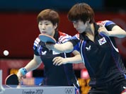 South Korea`s Seok Hajung, right, and Dang Yeseo compete against China`s Yue Guo and Li Xiaoxia during a women`s team table tennis semifinal match at the 2012 Summer Olympics.