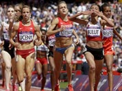 Turkey`s Gamze Bulut celebrates as she crosses the finish line to win her women`s 1500-meters heat during the athletics in the Olympic Stadium at the 2012 Summer Olympics.
