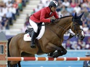 Japan`s Taizo Sugitani rides Avenzio during the equestrian show jumping competition at the 2012 Summer Olympics.