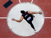 India`s Vikas Gowda competes in the men`s discus qualification during athletics competitions at the 2012 Summer Olympics at the Olympic Stadium in London.